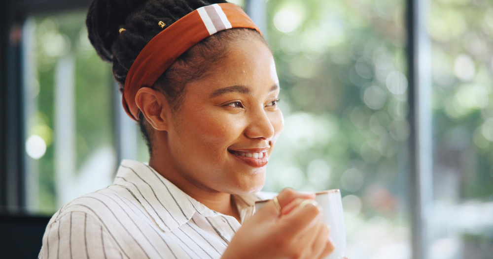 Office worker enjoying tea